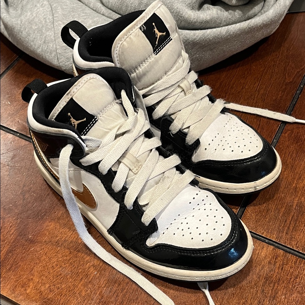 Jordan Black and White Sneakers with Gold Accents